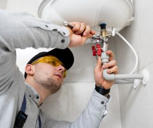 worker-repairing-water-heater_23-2149334230 worker-repairing-water-heater_23-2149334230